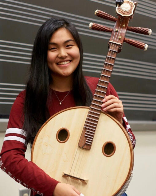 Life long ruan player; Received the highest level (level 10) certificate from the Arts Grade Examination Board of Nanjing Arts Institute